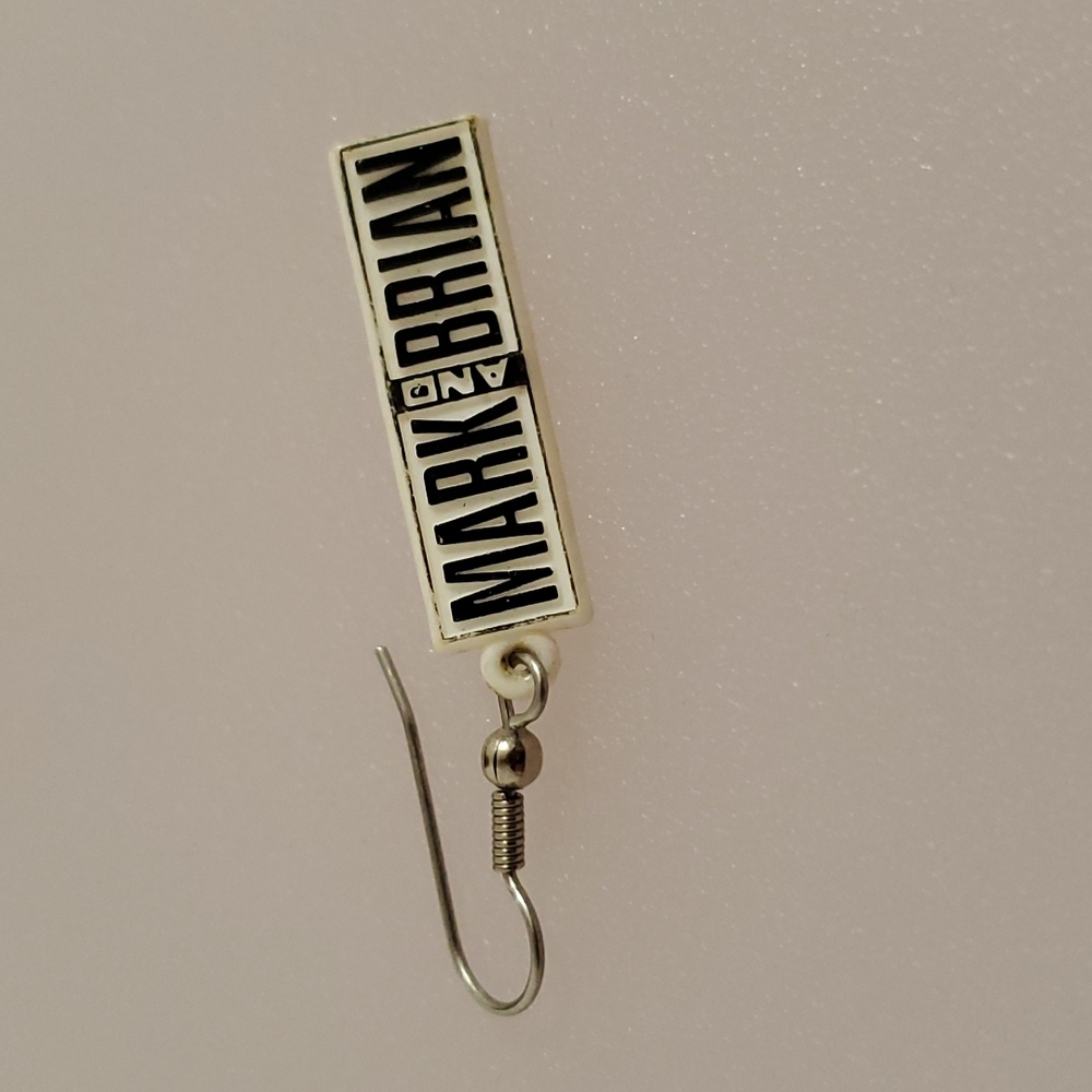•95.5 KLOS FM•Mark and Brian in the mornings•logo, single earring•